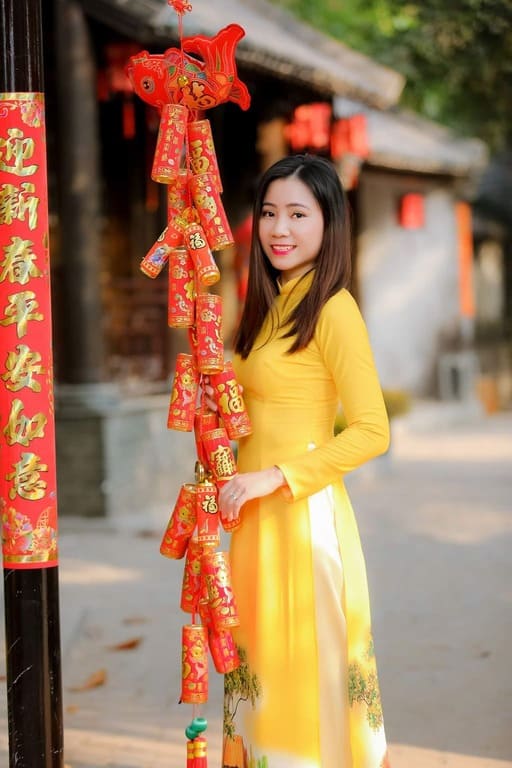 How to put faces into photos of Tet Ao Dai without Photoshop