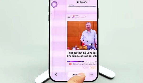 Place your finger on the address bar at the bottom and swipe gently